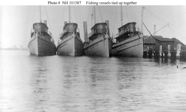 .  Photo of Menhaden fishing vessels about to be converted to naval vessels for wartime service. (Naval History and Heritage Command)