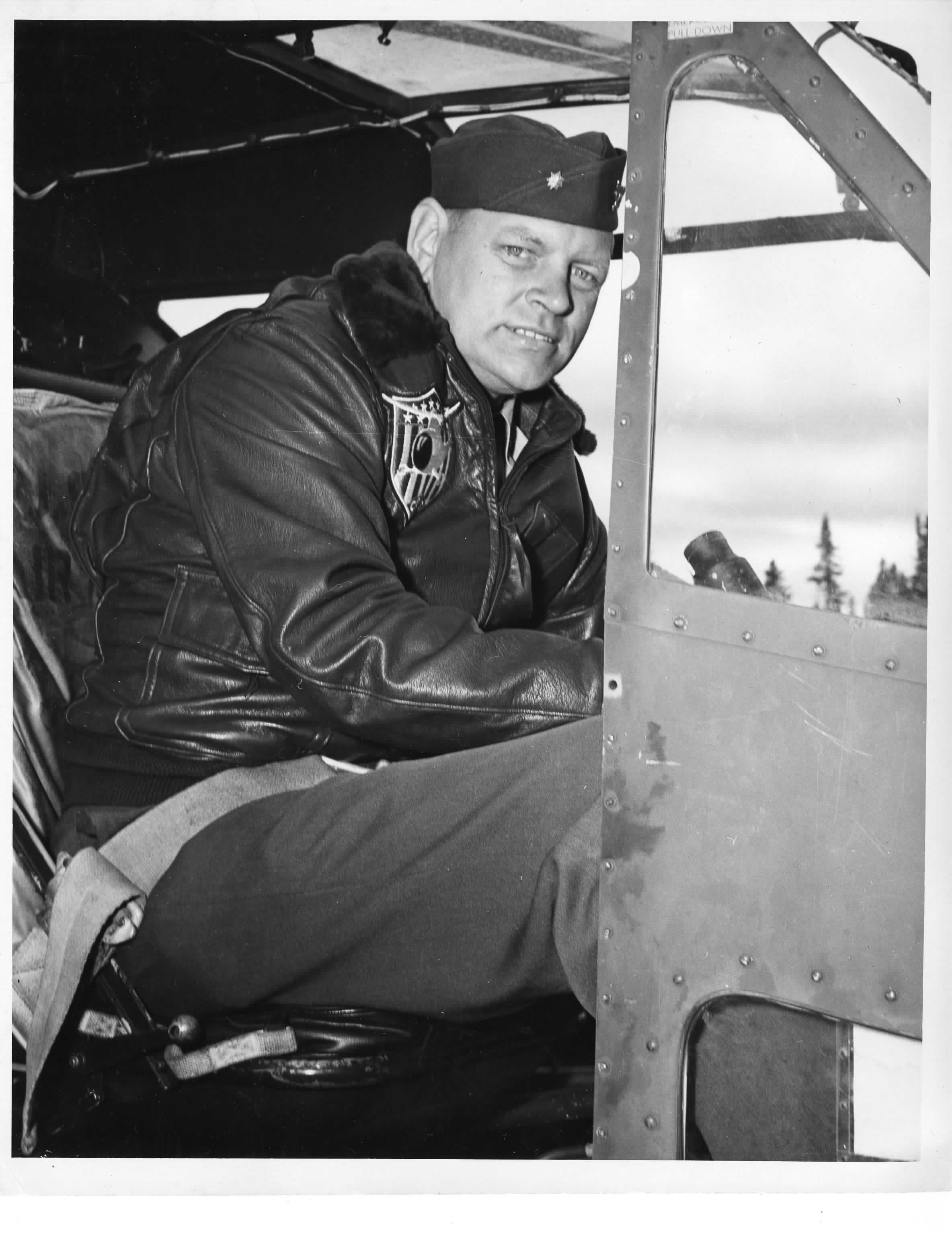 Lt. Cmdr. Frank Erickson, pioneer of helicopter flight, posing in the cockpit of a Coast Guard helicopter. (U.S. Coast Guard)