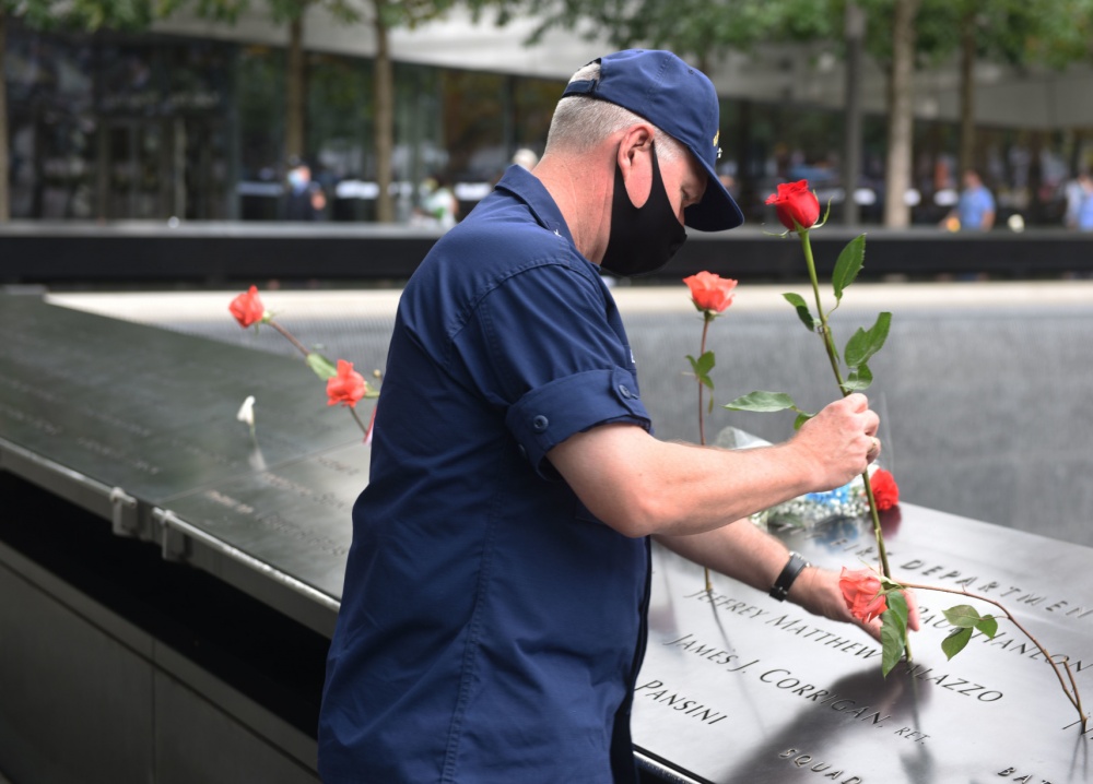 Vice Admiral Steven D. Poulin visits the 9/11 Memorial in New York City on September 11, 2020, to honor Coast Guard Reservists Jeffrey Palazzo and Vincent Danz, an NYPD Officer. (U.S. Coast Guard photo by Petty Officer 3rd Class John Rooney)