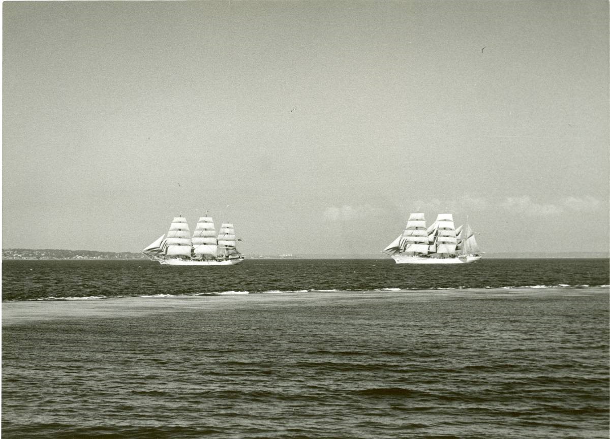 The Danmark, left and the Eagle, right, engage in a friendly race in Danish waters in 1954. (U.S. Coast Guard)
