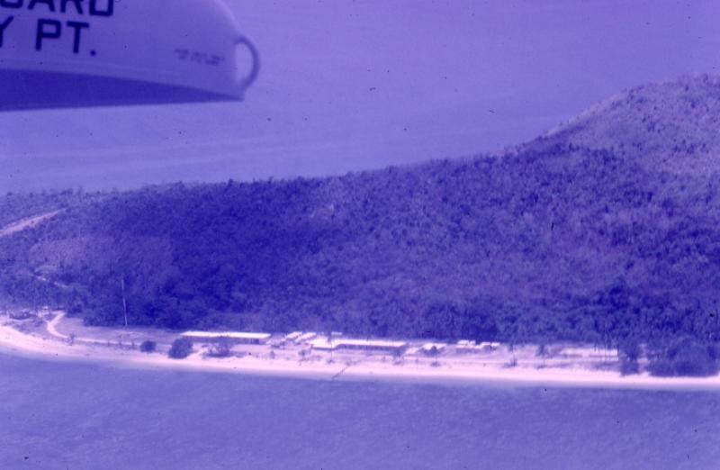 Aerial photo shot from a Coast Guard Albatross showing the white sandy beaches at LORSTA Talampulan. (loran-history.info)