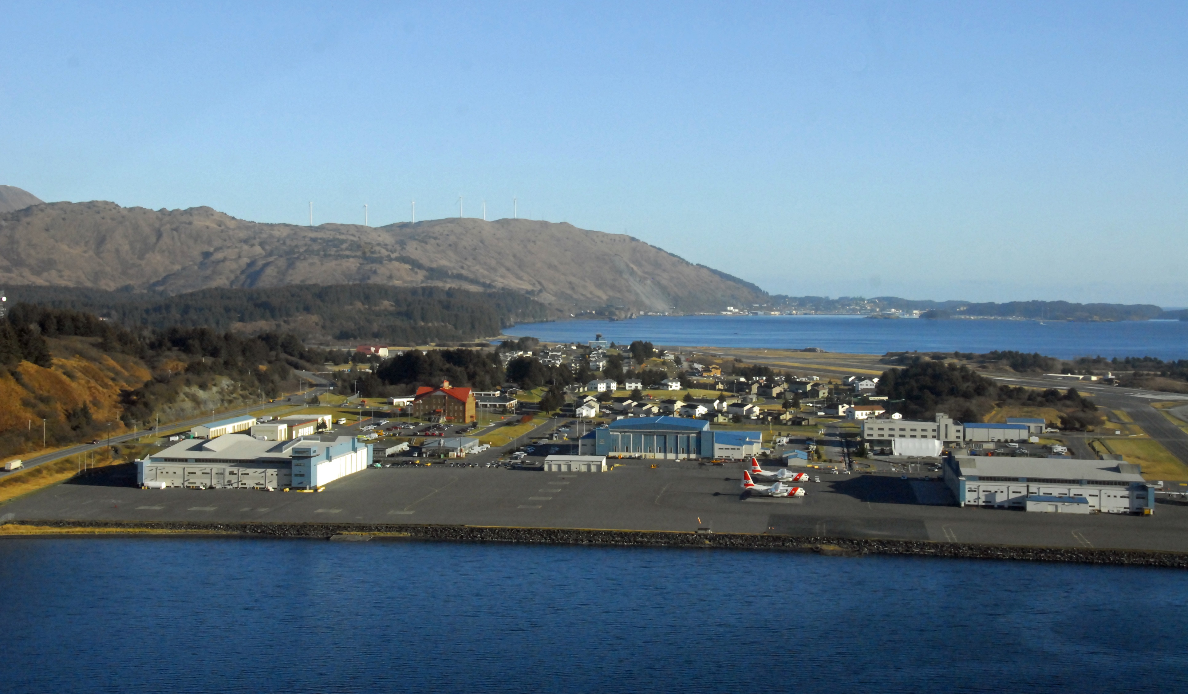 10.	A recent photograph showing the waterfront location of Coast Guard hangars at Air Station Kodiak. (Wikimedia)