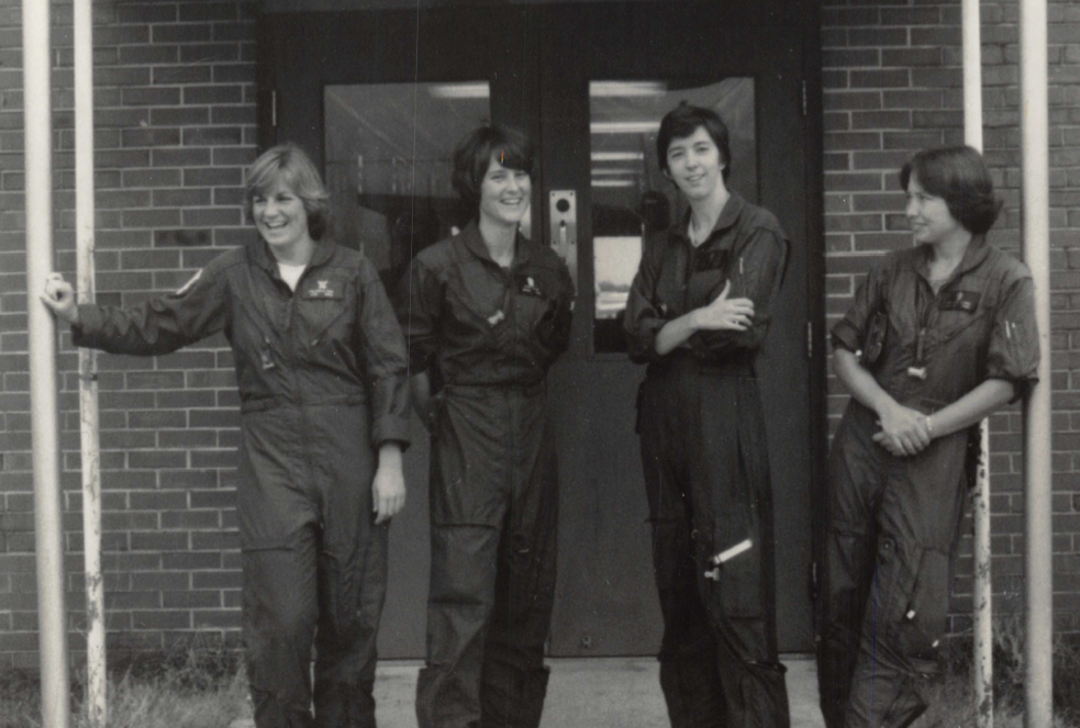 11.	Colleen Cain pictured at left with fellow female trainees at the flight school at Pensacola Naval Air Station. (U.S. Coast Guard)