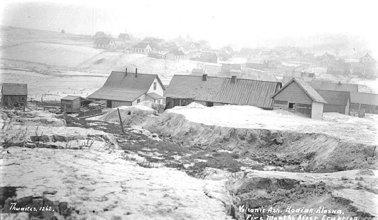 12.	Drifts and piles of volcanic ash surround homes and buildings in Kodiak, Alaska following the Katmai eruption, June 6, 1912. (Wikimedia)