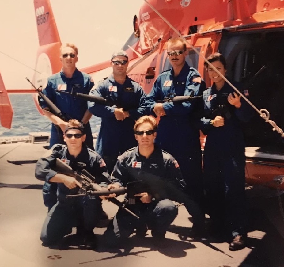 16.	Helicopter pilot Mara Huling Langevin (standing on right) photographed with aircrew in front of an HH-65. (U.S. Coast Guard)