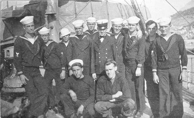 16.	Members of the Tampa’s crew pose together for a photograph. (Coast Guard Collection)