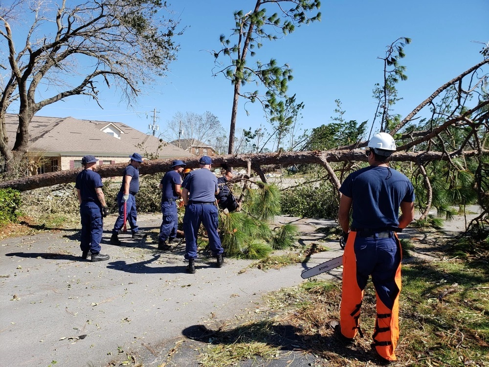 Coast Guard Members from Marine Safety Unit Pittsburgh help clear debris from blocked roads thoughout Mexico Beach and Panama City, Florida, Oct. 14, 2018. Hurricane Michael made landfall on Oct. 10, 2018 causing significant damage across Florida. U.S. Coast Guard photo by Petty Officer 1st Class Chris Hudgins