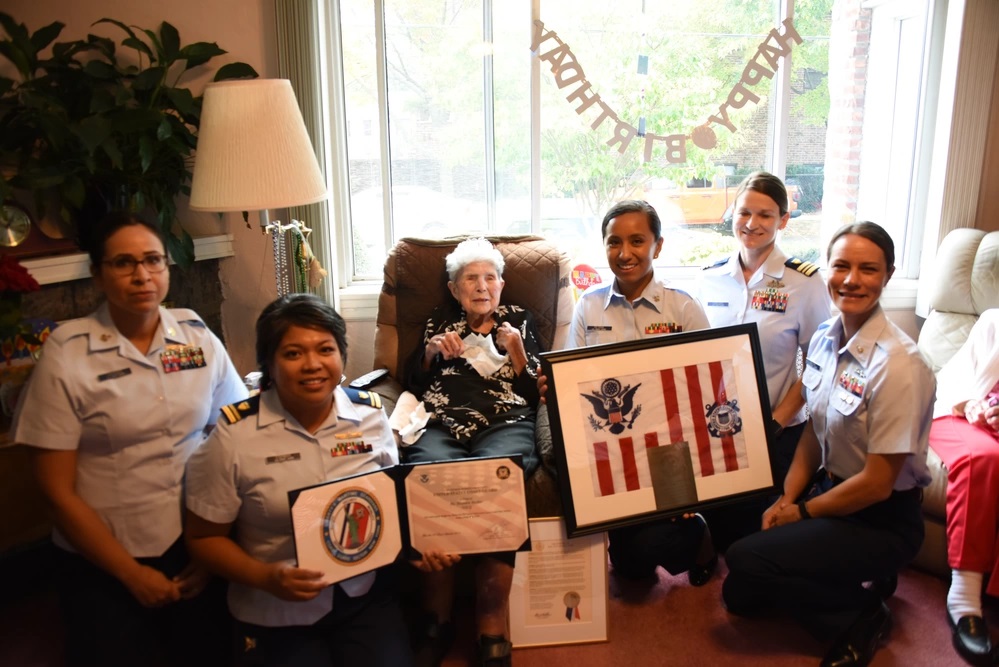 Mrs. Rosalen Becker, Coast Guard Radioman 3rd Class and trailblazer for women's equality, celebrates her 100th birthday with service members from Coast Guard Sector New York, Oct. 13, 2019. At the height of World War II, Rosalen volunteered for Semper Paratus Always Ready, better known as SPARS, the United States Coast Guard Women’s Reserve, where she specialized in communications technology and the upkeep of radio equipment. (U.S. Coast Guard photo by Petty Officer 1st Class Robert Harclerode)