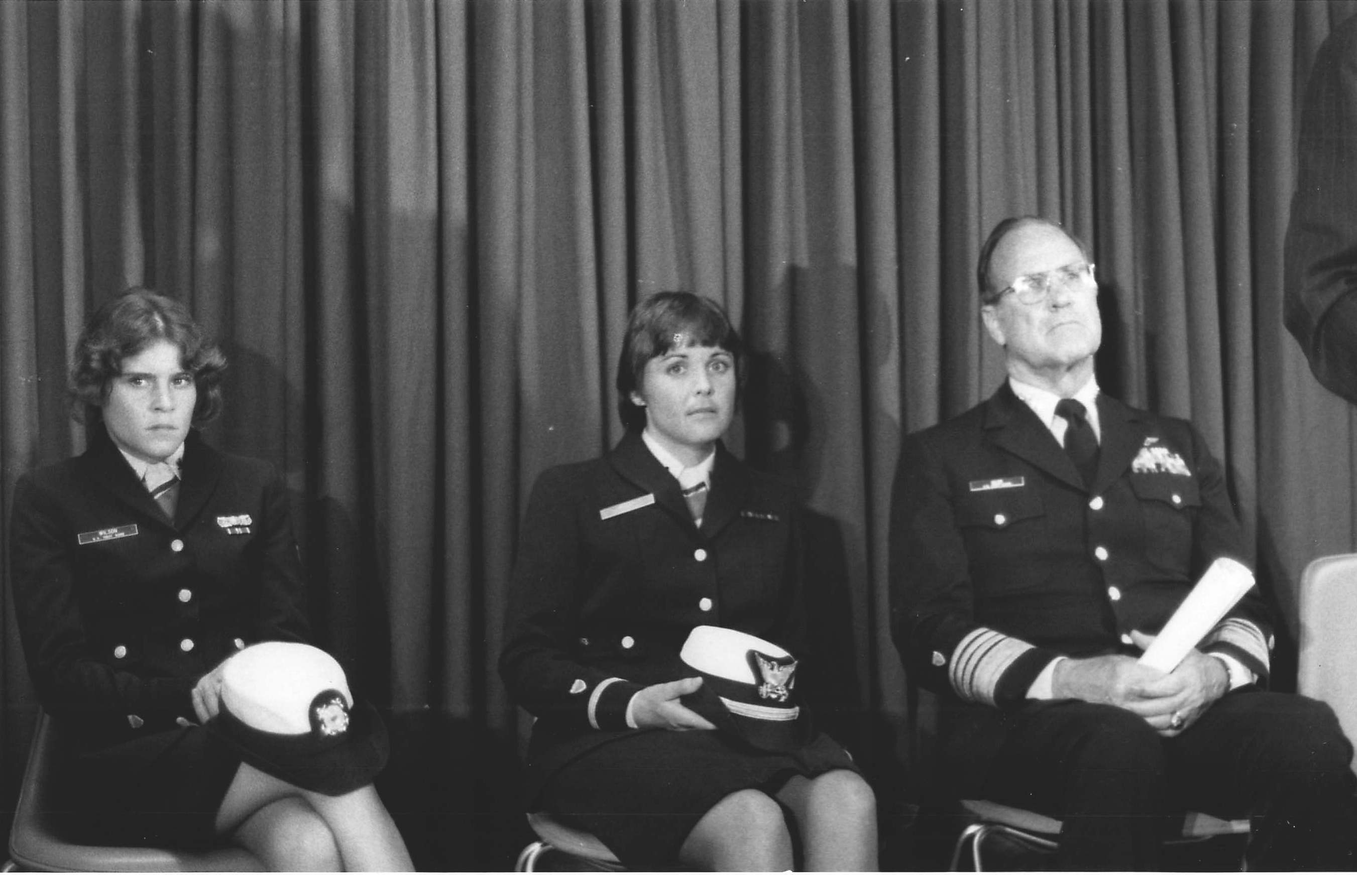 Coast Guard Commandant Owen Siler with female pioneers Petty Officer 3rd Class Debra Wilson and Ensign Beverly Kelley awaiting a press conference. (U.S. Coast Guard)