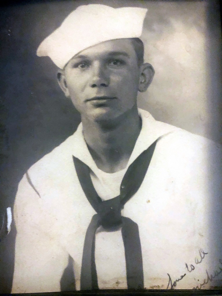 Official headshot of Michael J. Swierc, who enlisted in the Coast Guard Aug. 11, 1942, and trained as a motor machinist’s mate before deploying overseas for the first wave of the D-Day invasion. Swierc, who turned 100 years old Nov. 6, 2021, received the Navy and Marine Corps Medal for helping save 126 Allied troops from drowning in the English Channel on June 6, 1944. (U.S. Coast Guard, Courtesy of Pam Manka)