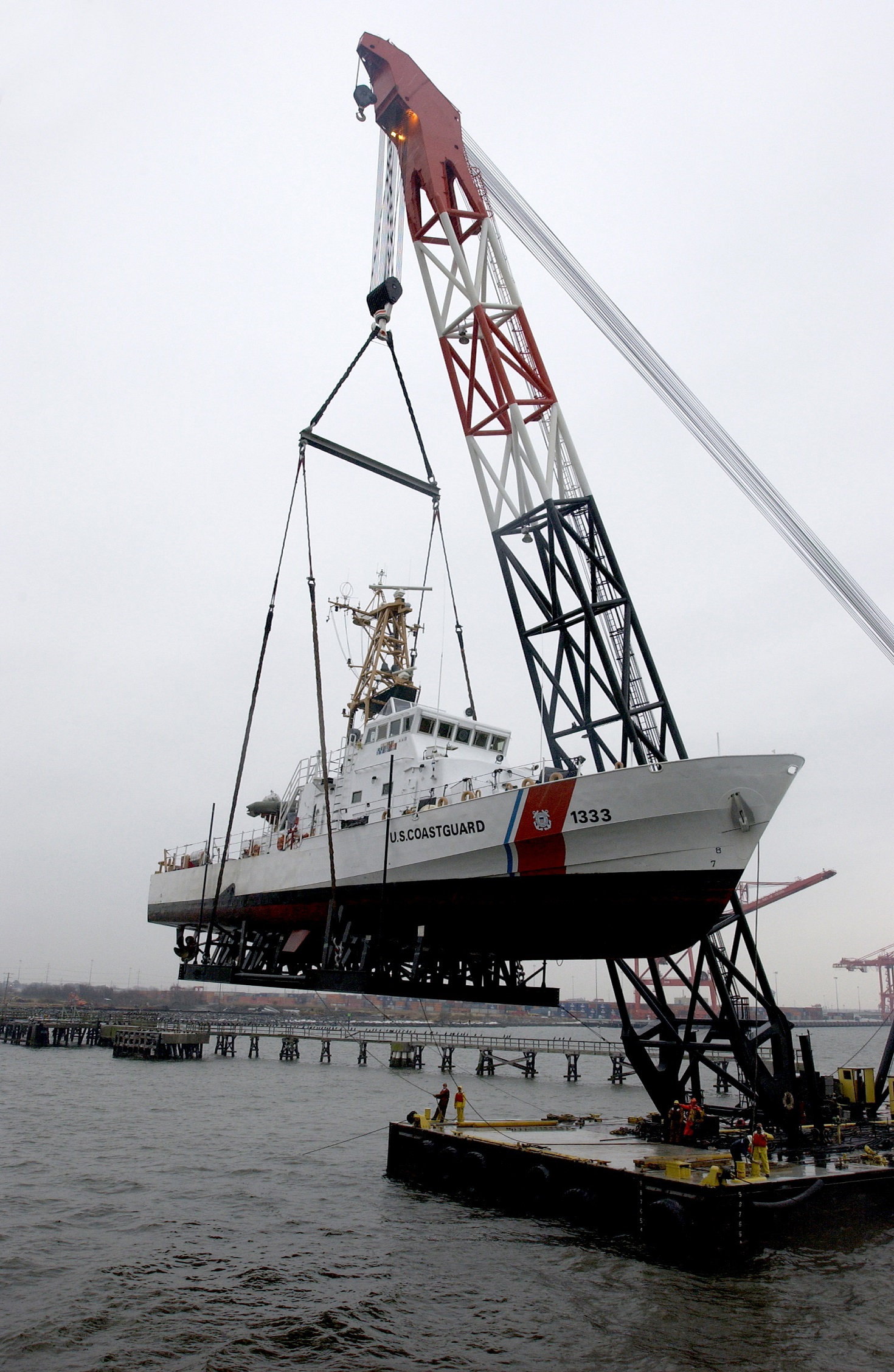 1.	The Coast Guard Cutter Adak, a 110-foot patrol boat, is loaded on board a Military Sealift Command vessel destined for the Middle East in early 2003. (Courtesy of U.S. Coast Guard)