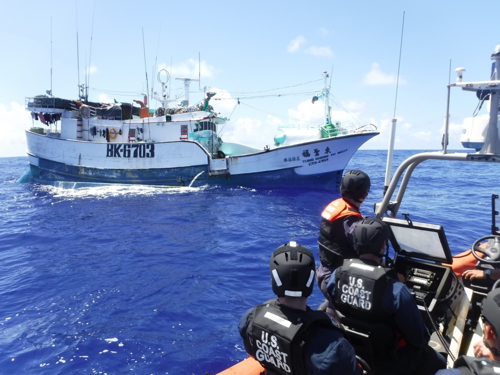 A boarding team from the USCGC Sequoia (WLB 215) approaches a Taiwanese fishing vessel in the Pacific Ocean, March 13, 2020. The crew undertook a fisheries patrol as part of joint efforts for Operation Rai Balang under the Forum Fisheries Agency. (U.S. Coast Guard photo by USCGC Sequoia/Released)