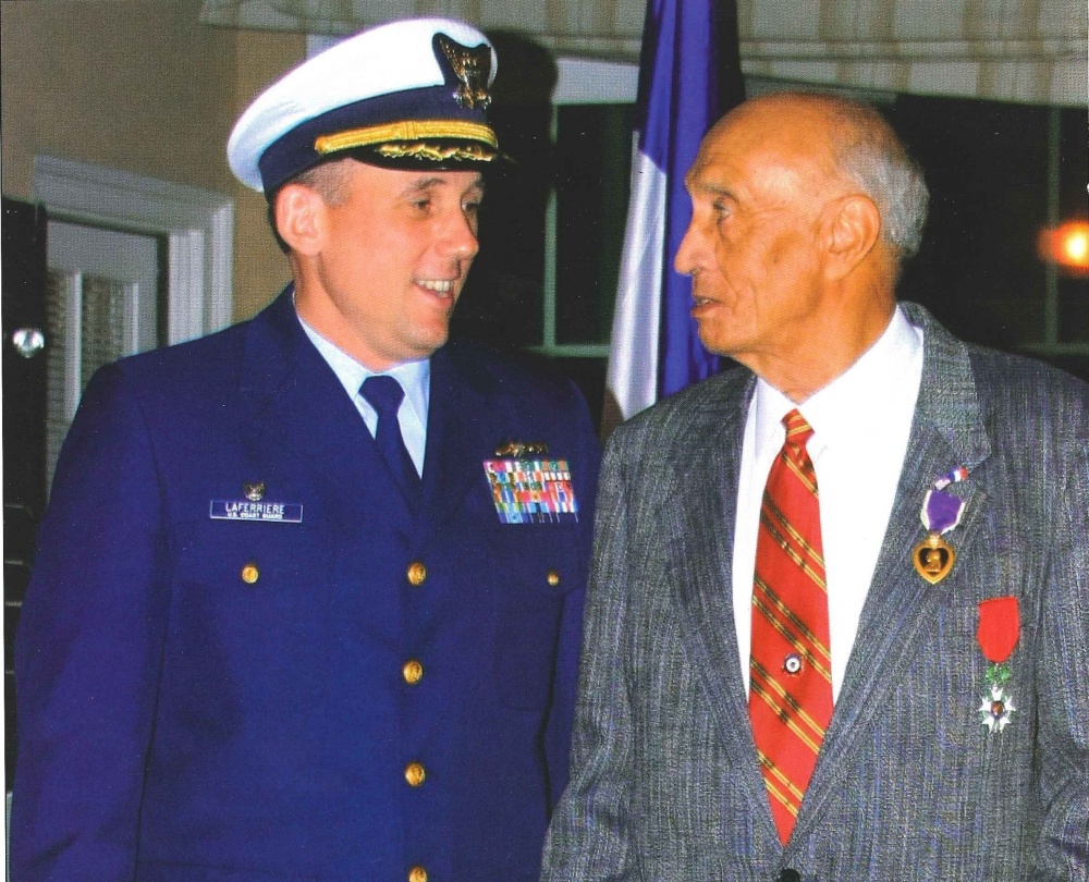 John Noble Roberts and Coast Guard Captain Roger Laferriere in May 2010 during a ceremony awarding Roberts the French Légion d’Honneur medal. (Photo by Marshall Metoyer