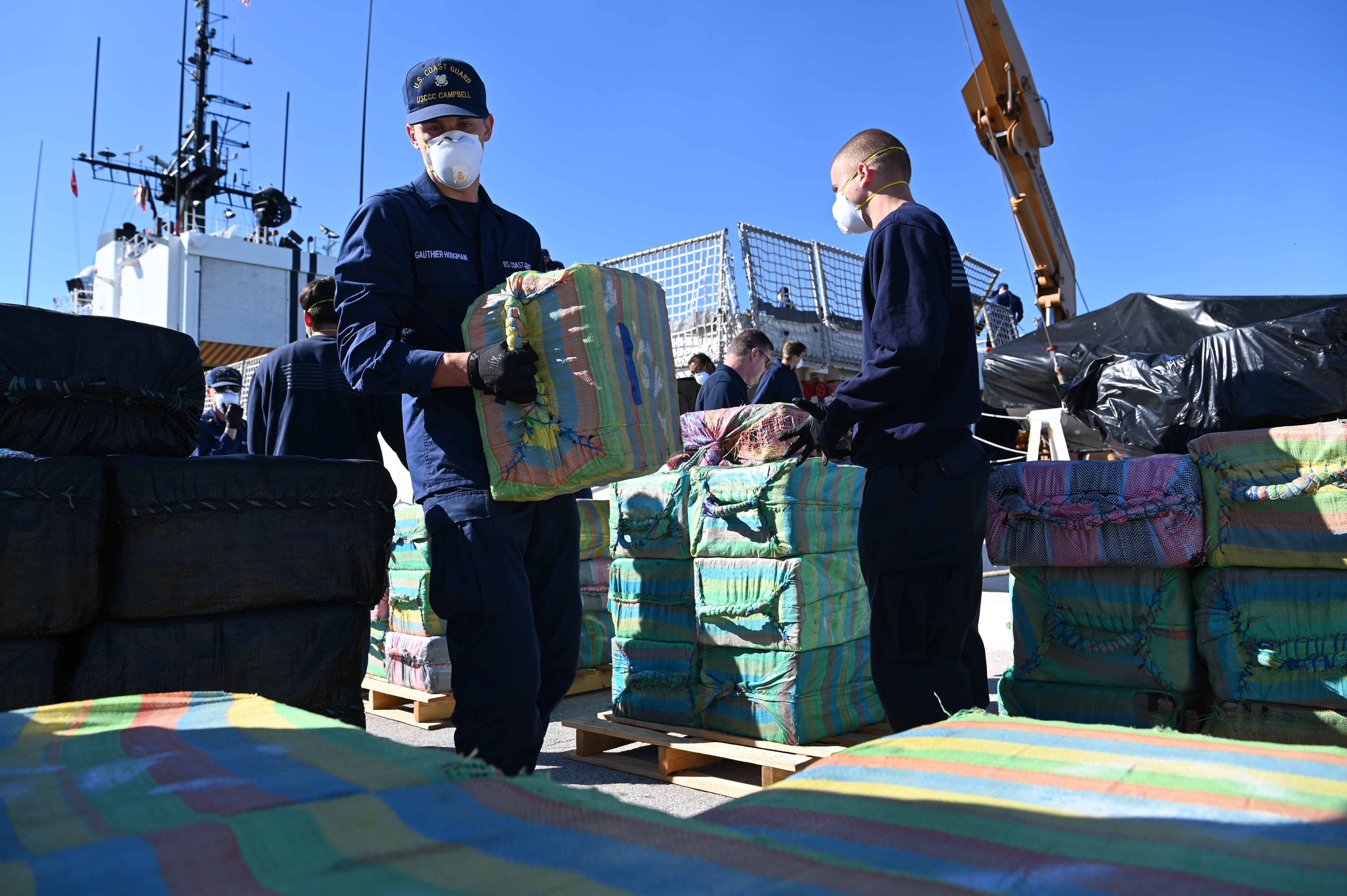 Crew members from USCGC Campbell (WMEC 909) offload more than 8,000 pounds of cocaine worth an assessed street value of approximately $91.3 million in Port Everglades, Florida, Jan. 27, 2025. The Campbell crew secured the illegal drugs from two interdictions in the international waters of the Eastern Pacific Ocean. (U.S. Coast Guard photo by Petty Officer 1st Class Diana Sherbs) Crew members from USCGC Campbell (WMEC 909) offload more than 8,000 pounds of cocaine worth an assessed street value of approximately $91.3 million in Port Everglades, Florida, Jan. 27, 2025. The Campbell crew secured the illegal drugs from two interdictions in the international waters of the Eastern Pacific Ocean. (U.S. Coast Guard photo by Petty Officer 1st Class Diana Sherbs)
