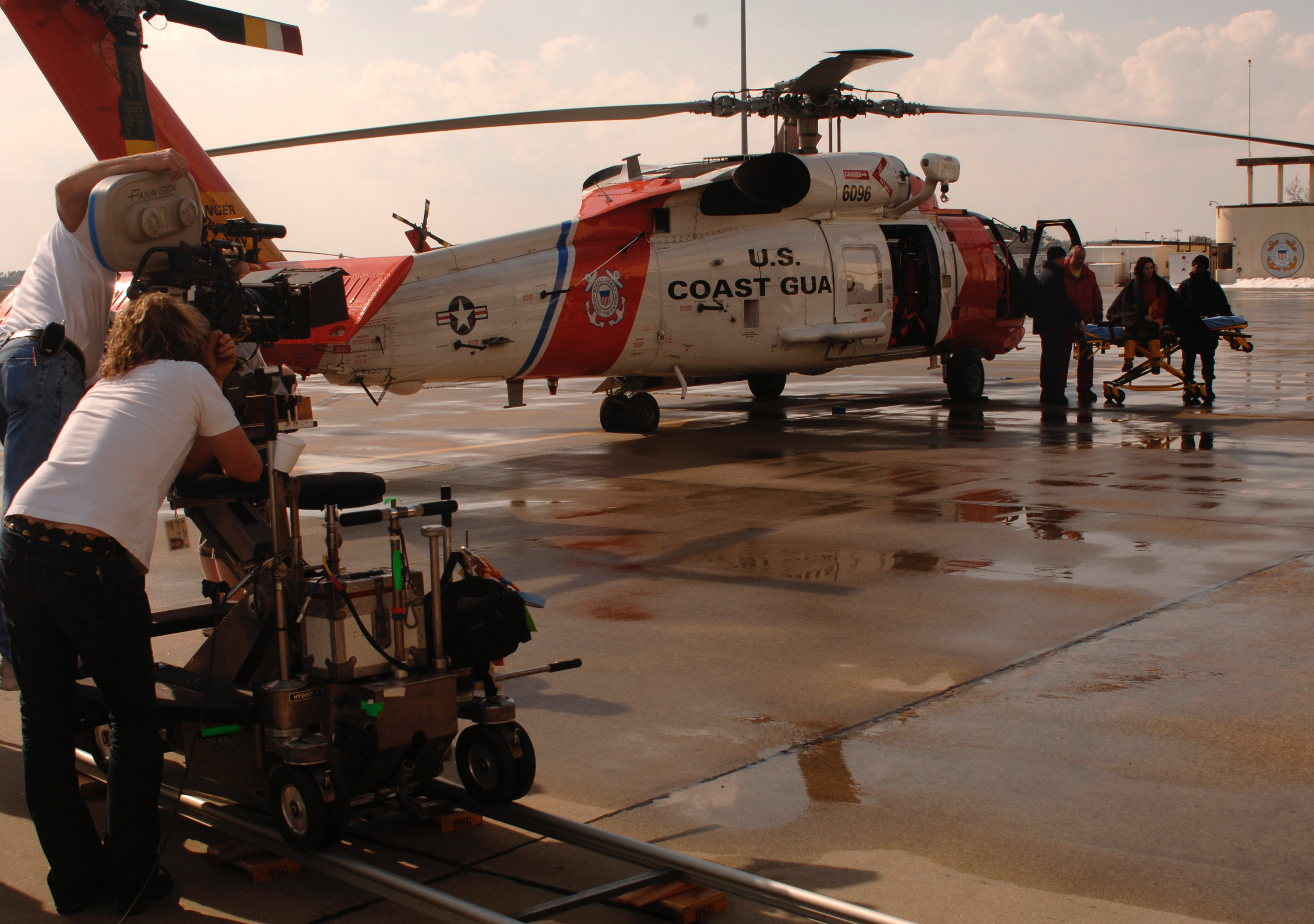 ELIZABETH CITY, N.C. (March 13, 2006)--Filmmakers were on-scene at Air Station Elizabeth City, shooting scenes for the upcoming movie ' The Guardian' starring Kevin Costner and Ashton Kutcher. The film slated for release this fall, features Costner as an AST "A" schol instructor, and Kutcher as a former college swim champion turned coastie who becomes his protege. Coast Guard photo bt PA3 Christopher Evanson. ELIZABETH CITY, N.C. (March 13, 2006)--Filmmakers were on-scene at Air Station Elizabeth City, shooting scenes for the upcoming movie ' The Guardian' starring Kevin Costner and Ashton Kutcher. The film slated for release this fall, features Costner as an AST "A" schol instructor, and Kutcher as a former college swim champion turned coastie who becomes his protege. Coast Guard photo bt PA3 Christopher Evanson.