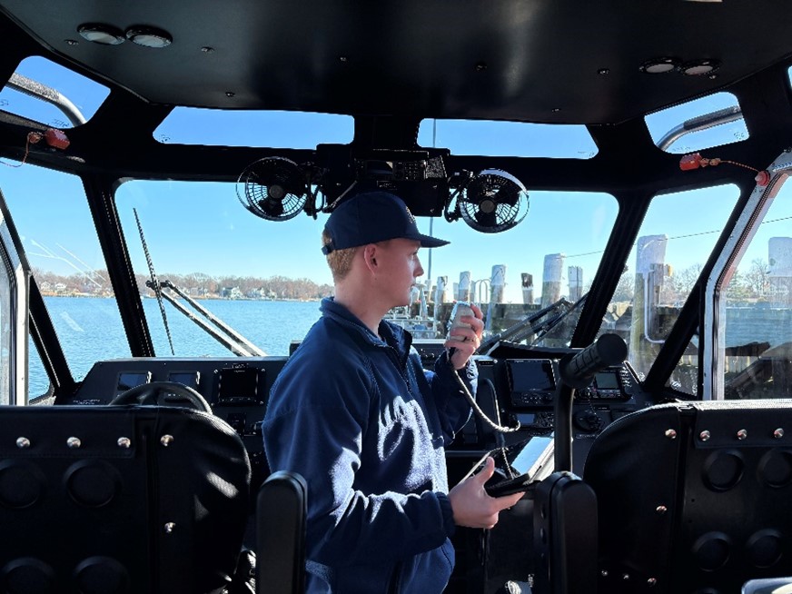 A U.S. Coast Guard member aboard a Response Boat-Small (RB-S) tests an iPad distributed as part of the Digital Seabag Pilot (U.S. Coast Guard photo courtesy of Lindsay Abbott). A U.S. Coast Guard member aboard a Response Boat-Small (RB-S) tests an iPad distributed as part of the Digital Seabag Pilot (U.S. Coast Guard photo courtesy of Lindsay Abbott).