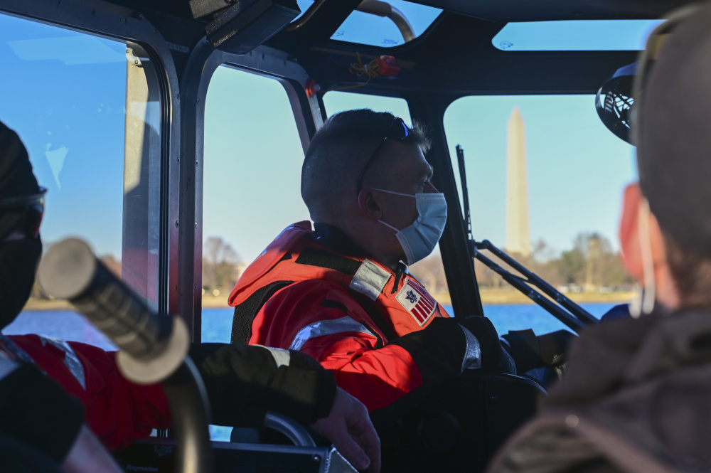 Chief Petty Officer Adrien Cheval, a reserve boatswain’s mate at Coast Guard Station Washington, patrols the water of the Potomac River in Washington ahead of the 2021 Presidential Inauguration, Jan. 19, 2021. 