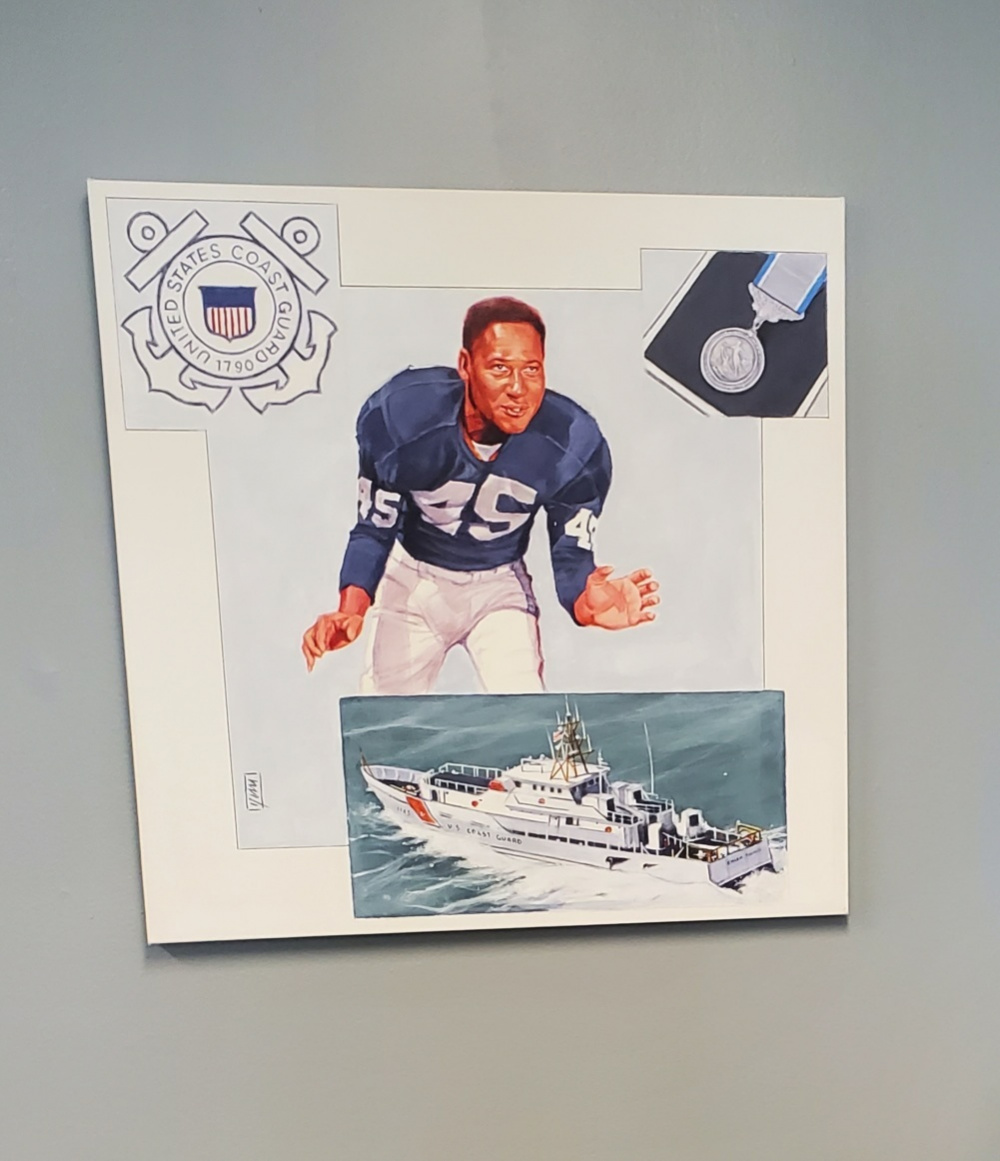 The Coast Guard commissioned a painting of Emlen Tunnel by artist Joh Yim. Emlen Tunnell was the first African American to play NFL football for the New York Giants. Tunnell also posthumously received the Coast Guard Silver Lifesaving Medal for his actions in World War II. (U.S. Coast Guard courtesy photo) 