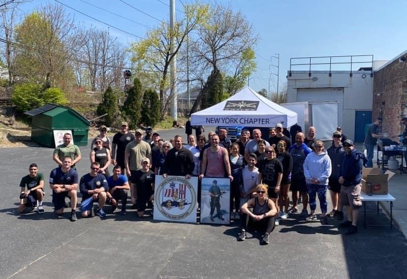 Members stop for a photo after the workout April 24, 2021. Photo by Lt. Anthony Emanuele.
