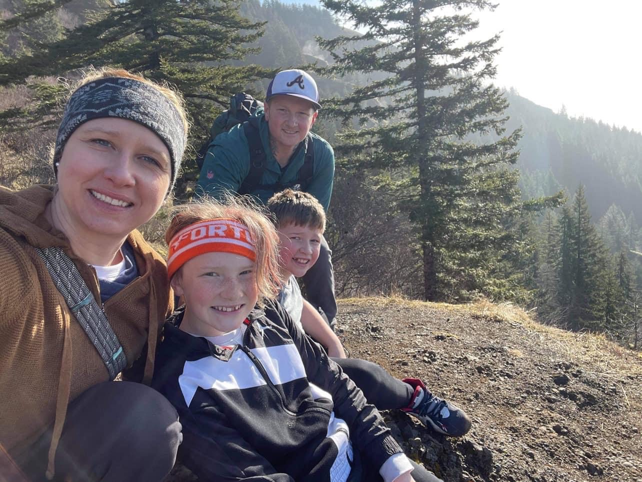 Coast Guard spouse, Justin Oldham, (on the far right) is pictured with his family: (left to right) Oldham's wife, Petty Officer 1st Class Cynthia Oldham, daughter Noella and son Tatum. Coast Guard spouse, Justin Oldham, (on the far right) is pictured with his family: (left to right) Oldham's wife, Petty Officer 1st Class Cynthia Oldham, daughter Noella and son Tatum.