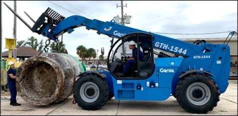  Crewmembers from Coast Guard Sector St. Petersburg and the Coast Guard Cutter Joshua Appleby move a standard 7 X 17 lighted buoy via telehandler, Nov. 19. 2021. Support equipment helps get the mission accomplished. (USCG photo) 