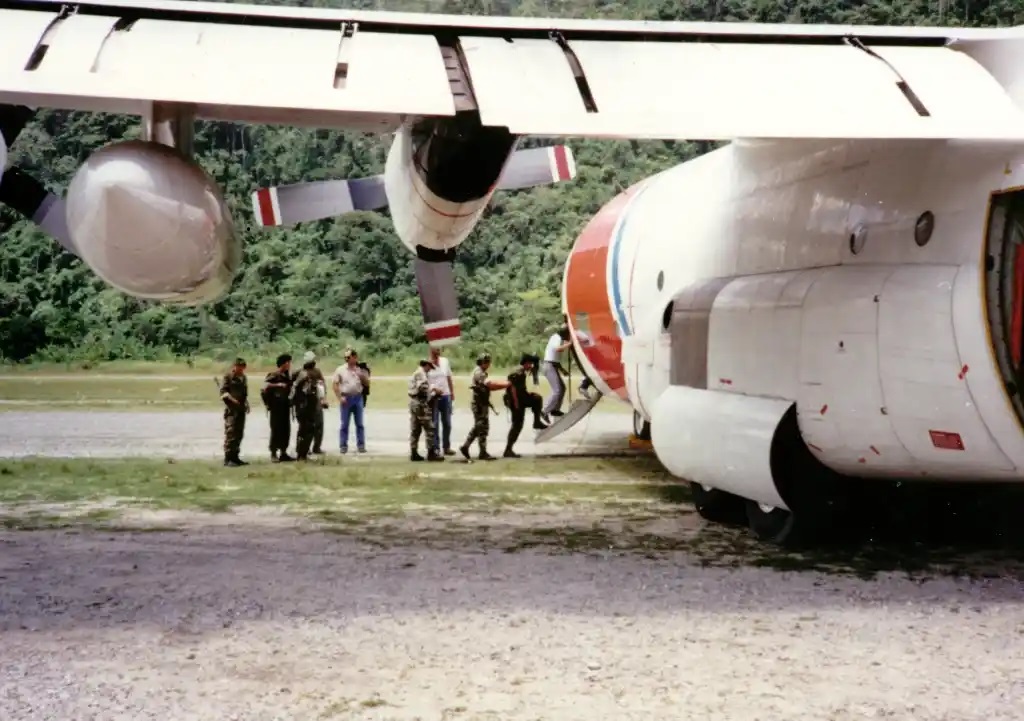 Rare photo of Coast Guard personnel boarding a C-130 employed in Peru-based Operation Jester. (Coast Guard Aviation Association)