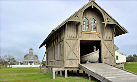 Picture of the Chicamacomico Life-Saving Station, showing the boathouse, crew’s quarters and motor lifeboat used by Keeper Midgett in the Mirlo rescue. (Chicamacomico Historical Association)