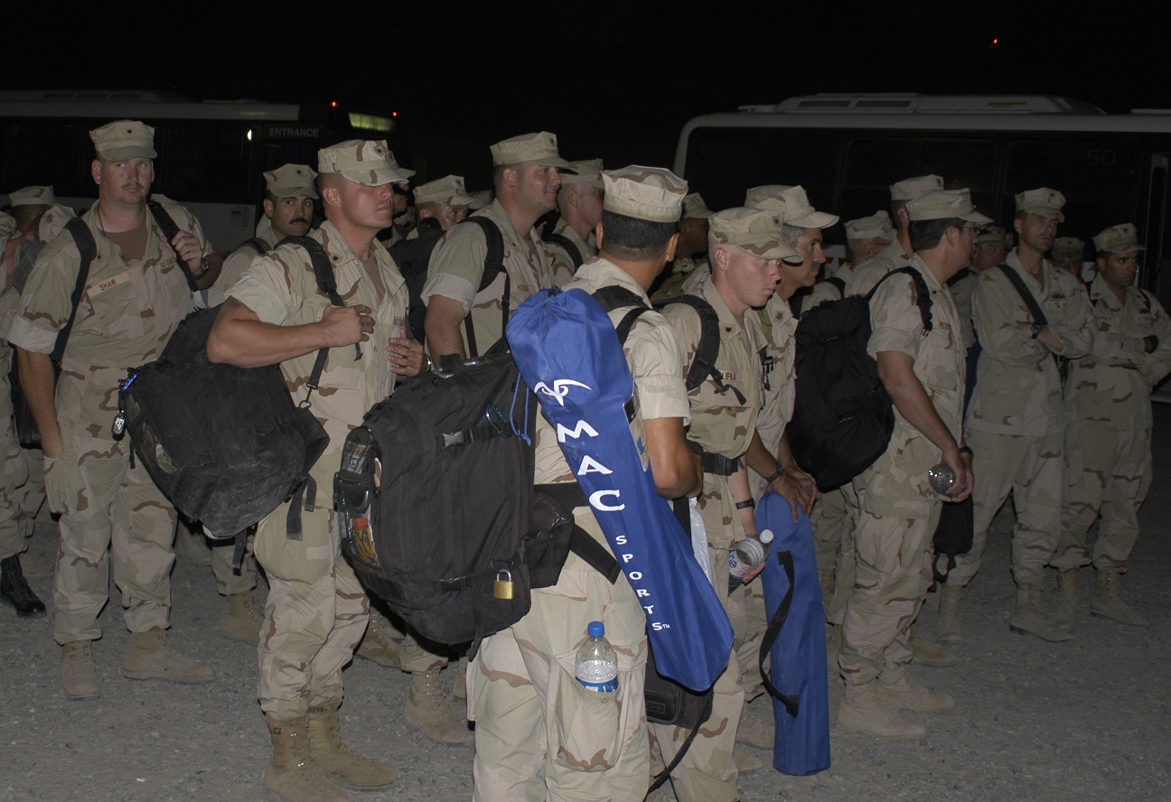 Members of Port Security Unit 311 out of San Pedro, California, deploys in support of Operation Iraqi Freedom in February 2003. (U.S. Coast Guard)