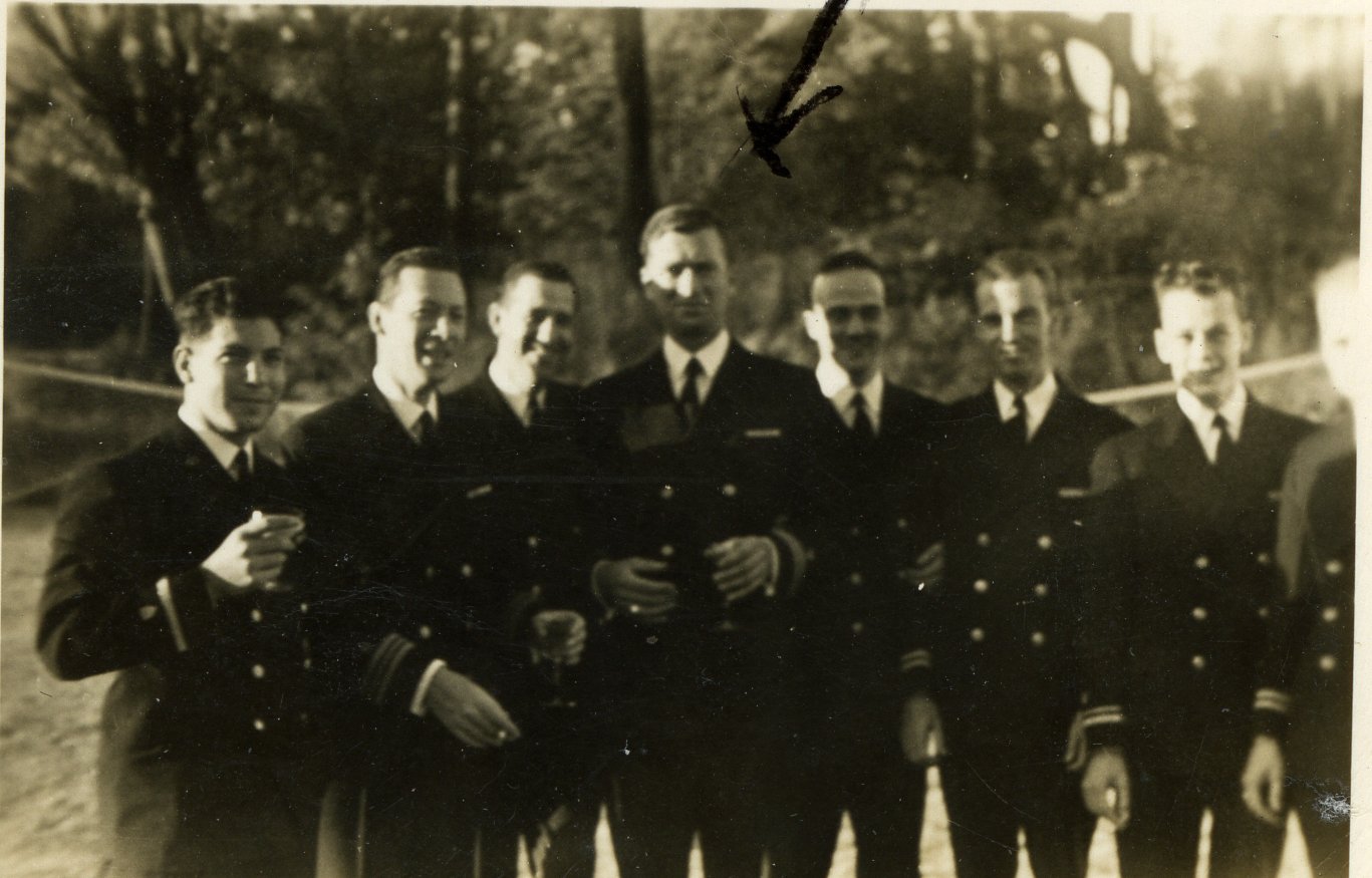 2.	Buddy Ebsen (center) poses in a faded photo with fellow junior Coast Guard reserve officers. (U.S Coast Guard)