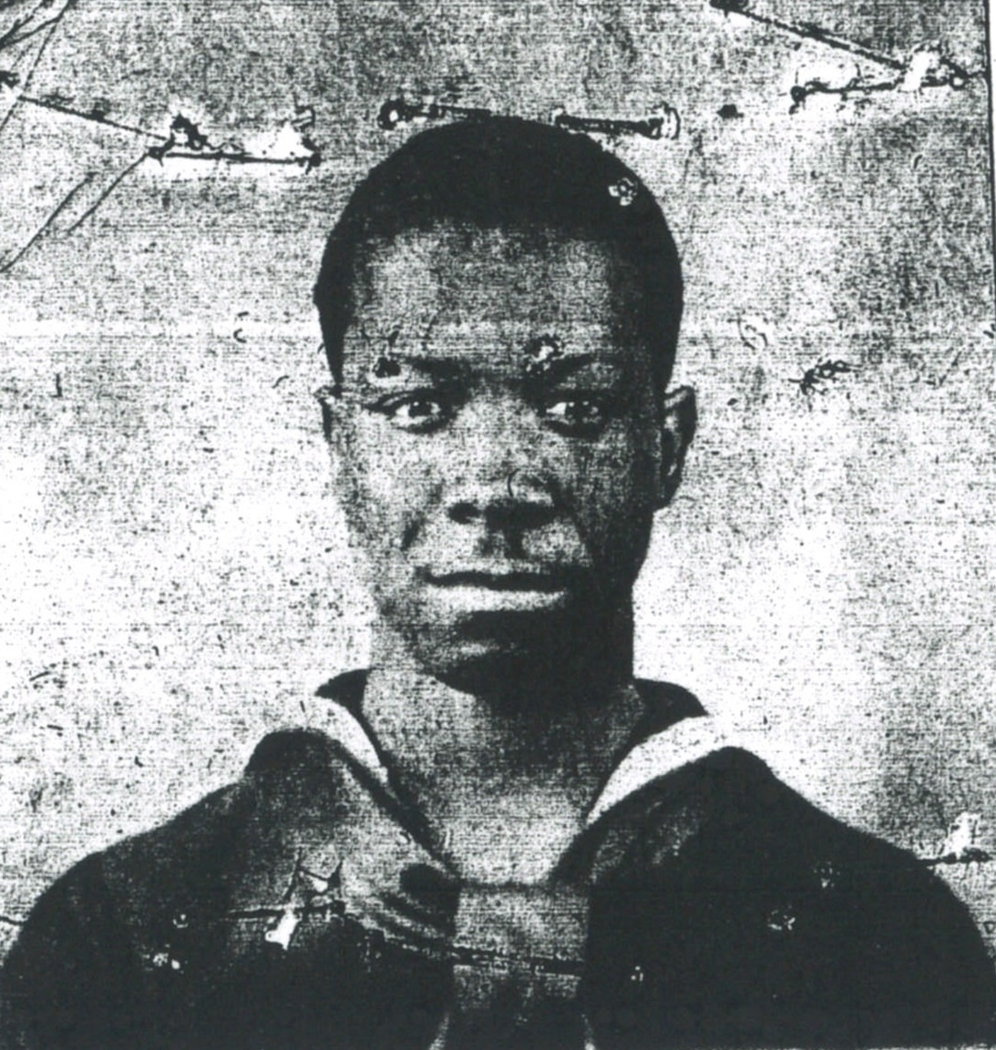 Faded photograph of Louis Etheridge early in his career as a third class mess attendant. (U.S. Coast Guard)