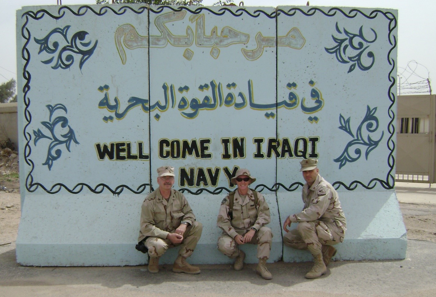 2.	Capt. Doug Heugel (left), chief of Combatant Commander Operations Branch (LANT-3R5) poses with members of the RAID Team and Port Security Unit 307 in 2008, during a staff visit to Iraq. (U.S. Coast Guard)