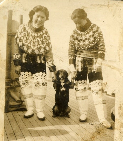 2.	Sinbad makes friends with Greenland natives before the official U.S. entry into World War II. (U.S. Coast Guard)