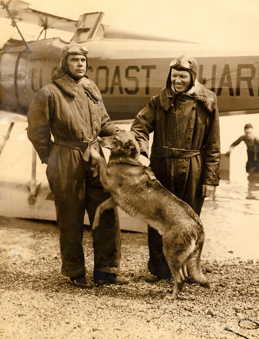 2.	Lt. Cmdr. Carl Chrisitan. von Paulsen, his dog “Brutus” and co-pilot Ensign Lawrence Melka, pose in front of their borrowed Navy Vought UO-1 amphibian biplane at Gloucester, Massachusetts. (photo courtesy of the von Paulsen family)