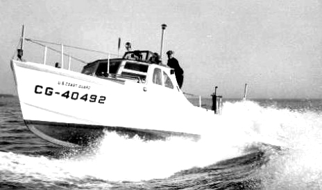A 36-foot motor lifeboat similar to the type used in the Mermaid rescue surfing through breakers. (U.S. Coast Guard)