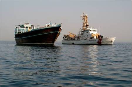 110-foot patrol Coast Guard Cutter Adak interdicts a local dhow in the Northern Persian Gulf. (U.S. Coast Guard)