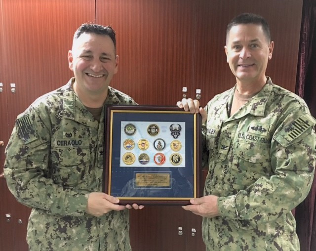 3. Capt. Tony Ceraolo, PATFORSWA Commodore presents Capt. Scott McKinley, Chief of Contingency Operations (LANT-39) with a plaque of appreciation in 2016 for LANTAREA support of PATFORSWA. (U.S. Coast Guard)