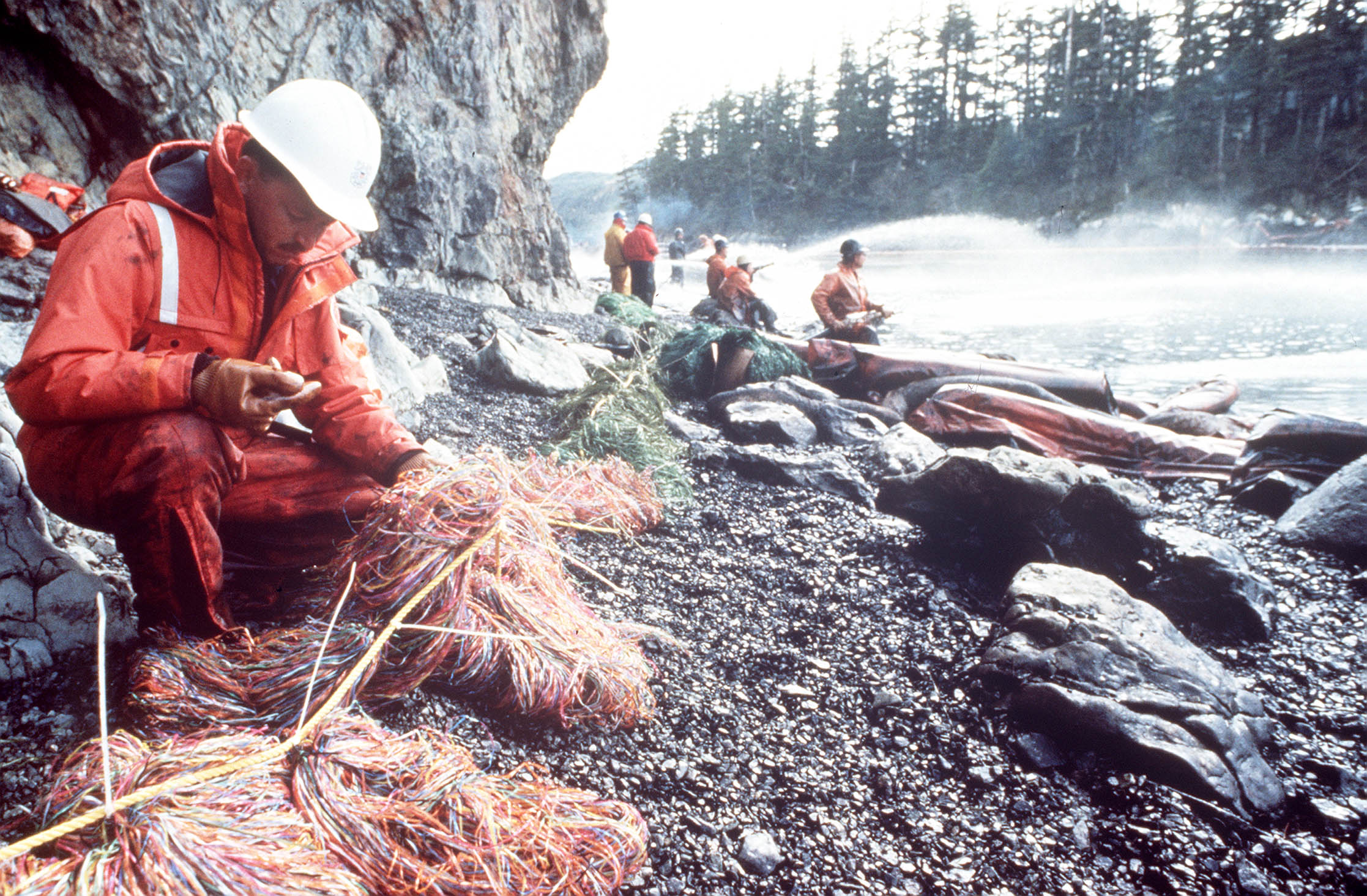 Coast Guard members with coastal clean-up crews in Prince William Sound. (U.S. Coast Guard)