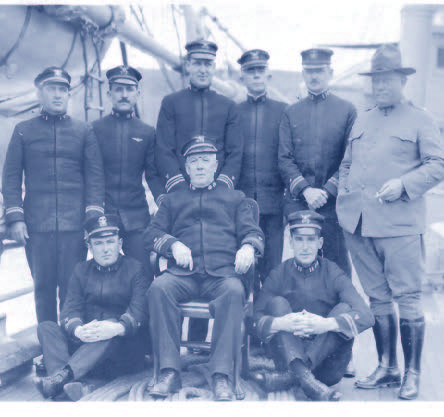 Photograph of Frederick Dodge (seated center), later in his career as commanding officer of the Coast Guard Cutter Unalga. (U.S. Coast Guard)