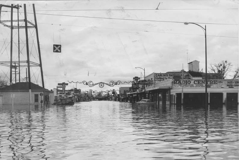 3.	Flooded downtown of Yuba City showing Christmas decorations over the main street. (calisphere.org)