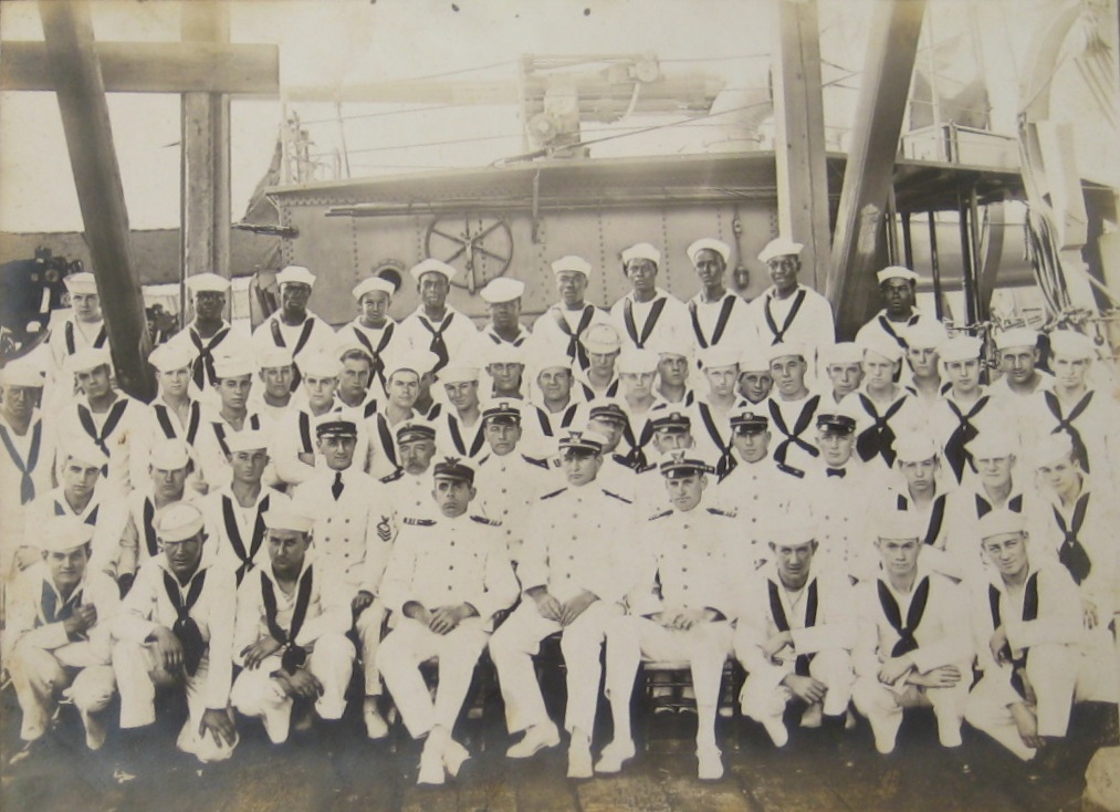 The full crew of the Coast Guard Cutter Earp with a young Clarence Samuels standing in last row fourth from the left. (Wikipedia)