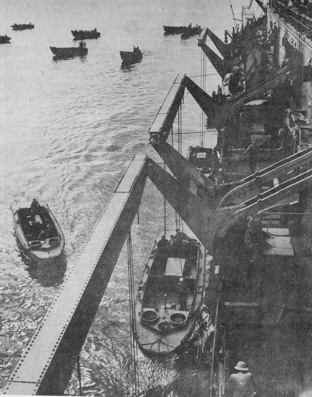 3.	A transport deploying a Landing Craft Personnel (LCP) for the landings at Guadalcanal. Notice the solid bow, tandem machine gun tubs and the stern where depth charges were mounted on Ray Evans’s anti-submarine patrol boats. (Courtesy of the U.S. Navy)