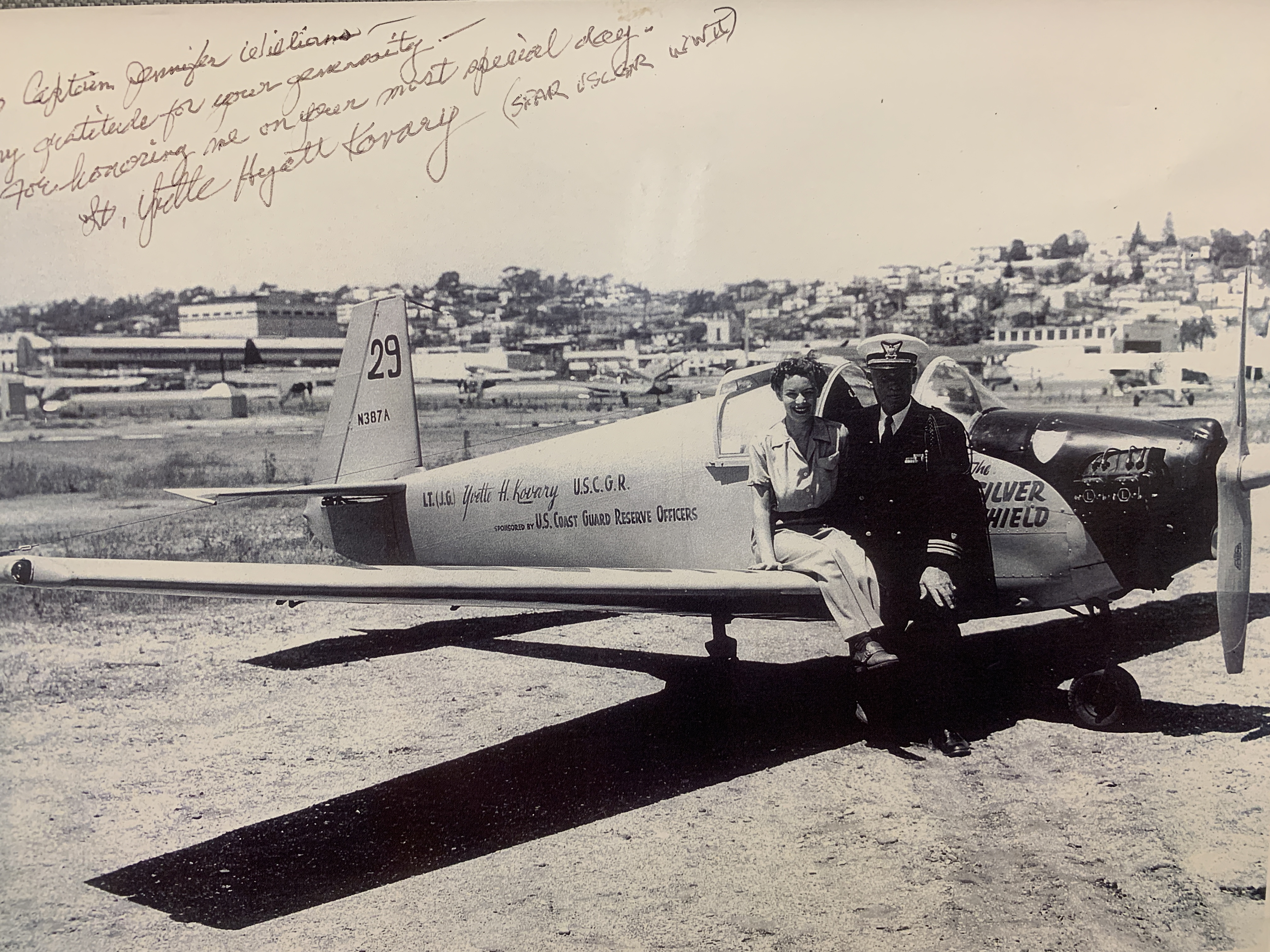 SPAR Lt. Yvette Hyatt Kovary, seated with a Coast Guard officer on the wing of her aircraft during World War II. (Courtesy of Yvette Hyatt Kovary)