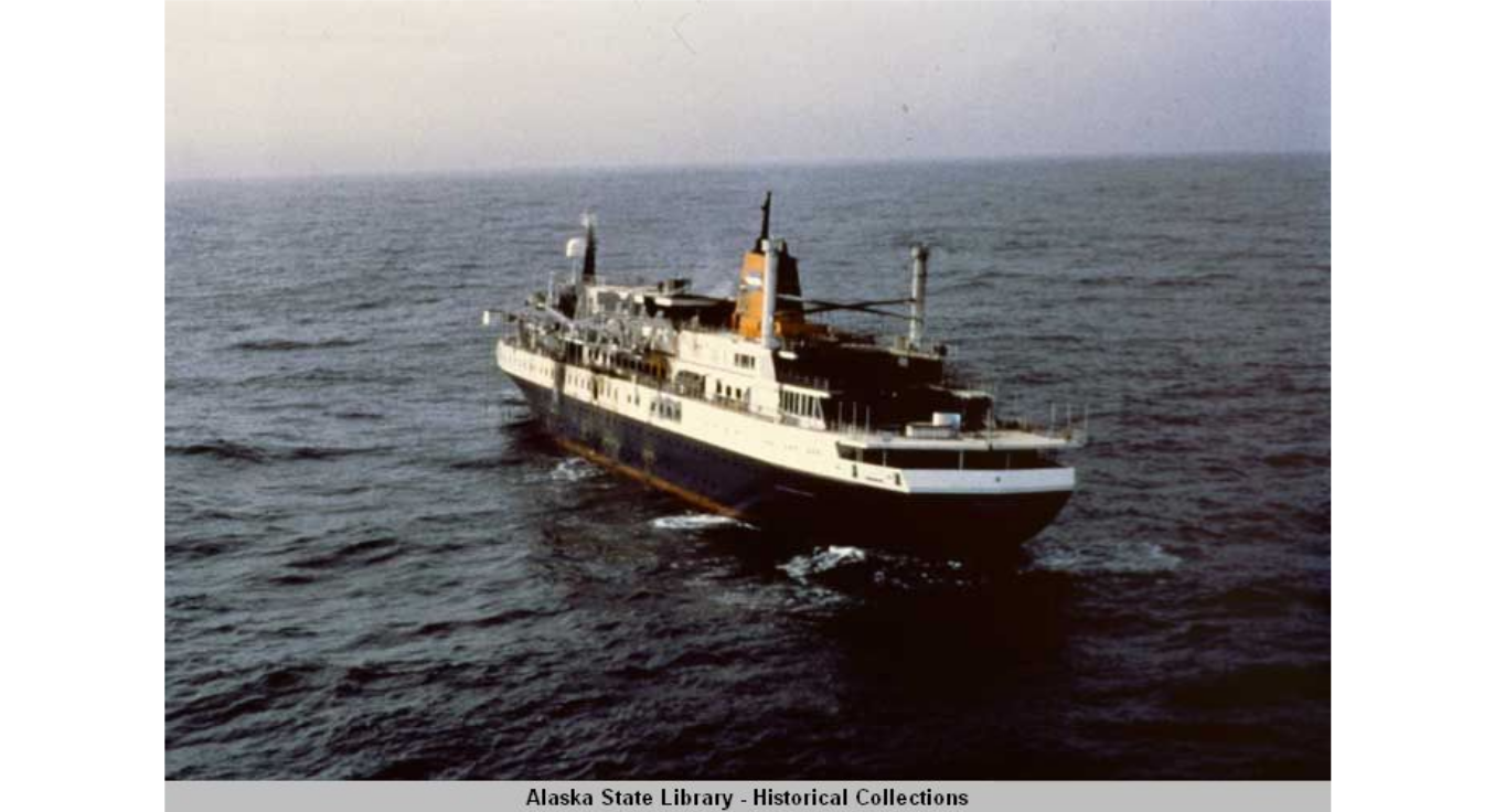 Fire damaged, but still very much afloat, Prinsendam drifts in relatively calm seas. (Alaska State Library)