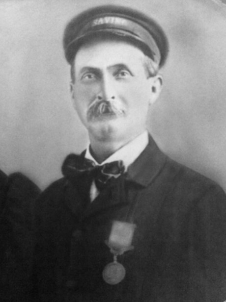 An official photograph of Surfman Rasmus S. Midgett in uniform wearing the Gold Lifesaving Medal. (U.S. Coast Guard)