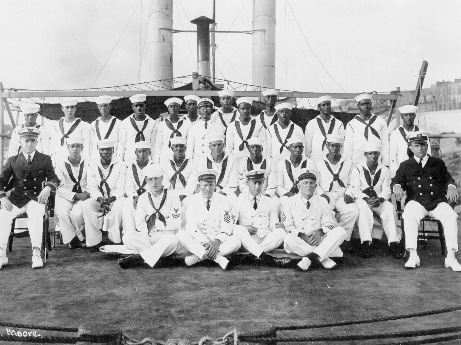 A rare image of River Cutter Yocona’s crew in 1925 shows her black enlisted men, and white officers and non-commissioned officers posed aboard the cutter. (Courtesy of U.S. Coast Guard)