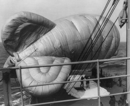 Coast Guard Cutter Courier’s antenna balloon similar to the barrage balloons flown over potential military targets during World War II. (The crew of the Coast Guard Cutter Courier, as collected by the Coast Guard Cutter Courier/VOA Association)