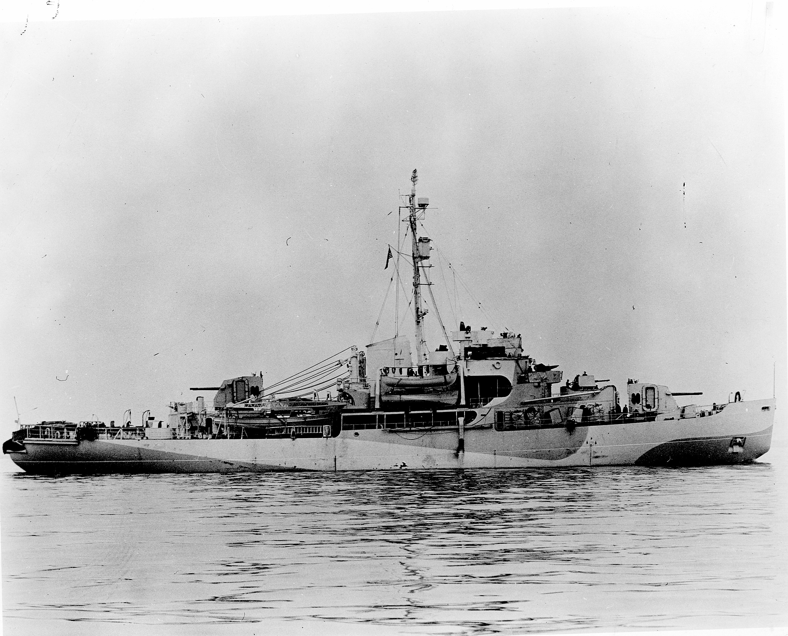 Icebreaker Eastwind in World War II’s Greenland Patrol with ice camouflage paint scheme. Thomas was the plank-owning captain of the heavily armed icebreaker. (U.S. Coast Guard)