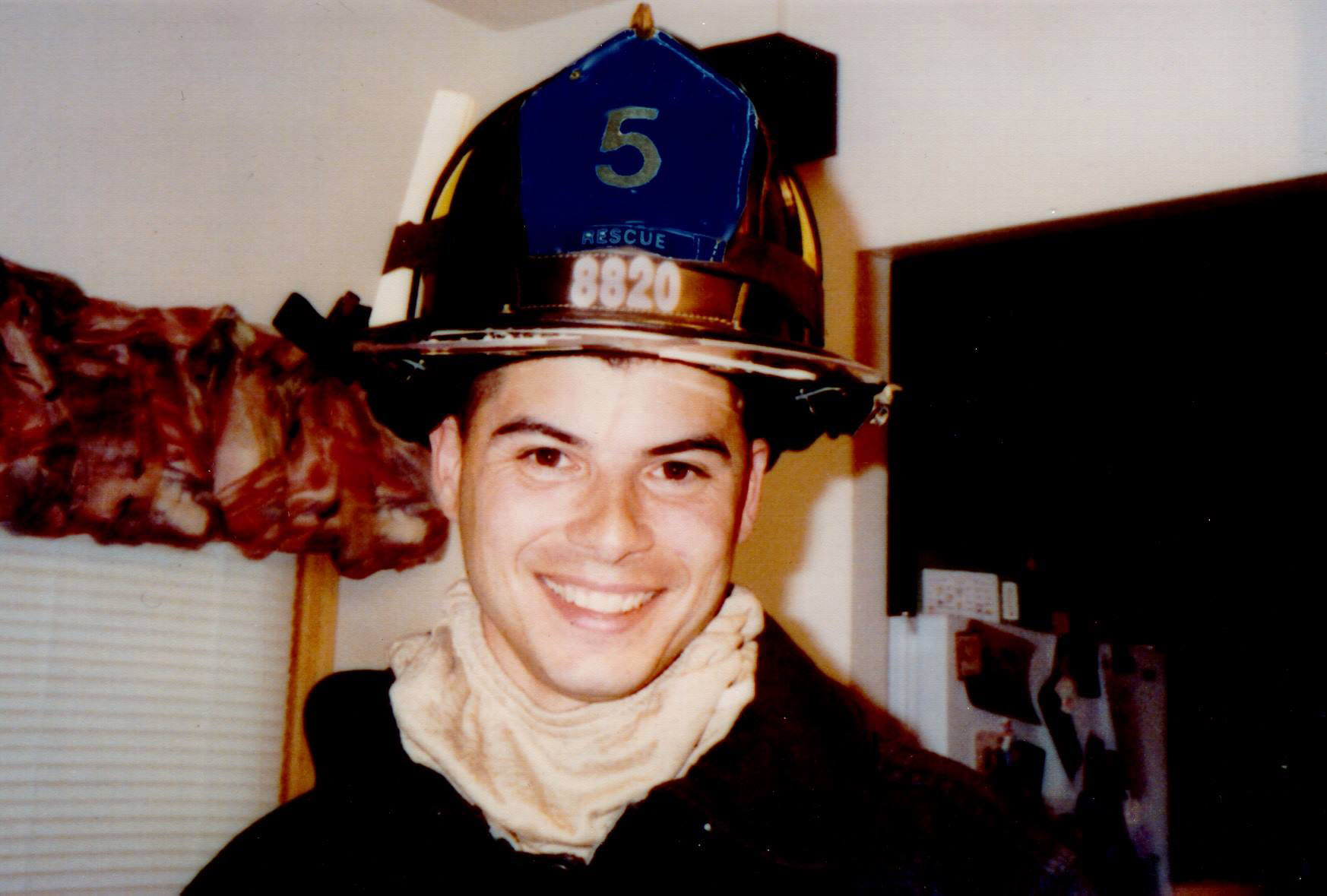 New York firefighter Jeffrey Palazzo dressed out in his helmet and firefighting gear. (Courtesy of the Palazzo Family)