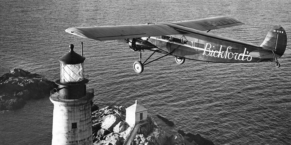 4.	A Flying Santa Ford Tri-Motor delivers a parcel to Graves Light near Boston. (Courtesy Friends of Flying Santa)