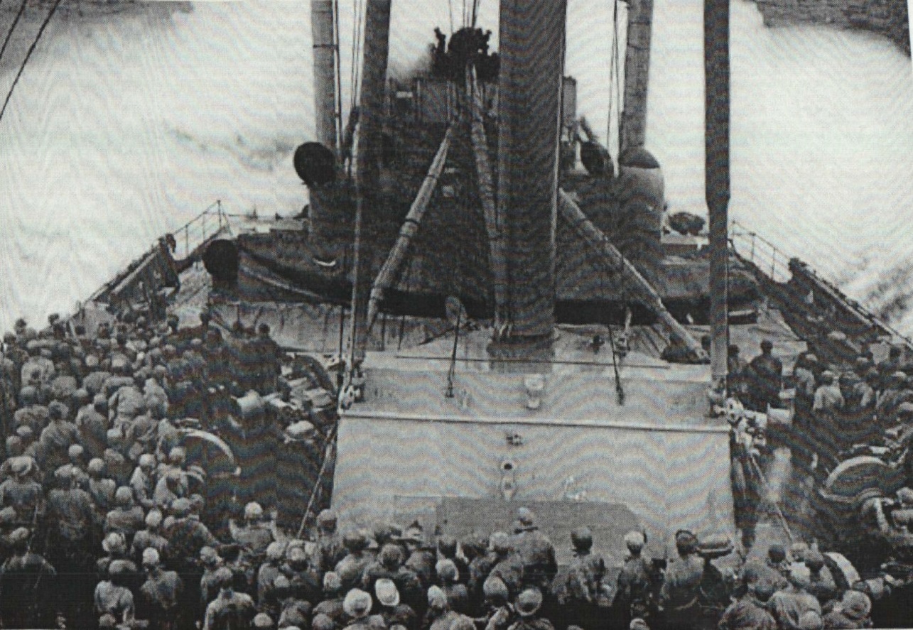 The Wakefield steaming through heavy seas with troops on deck avoiding sea sickness. (U.S. Coast Guard) The Wakefield steaming through heavy seas with troops on deck avoiding sea sickness. (U.S. Coast Guard)